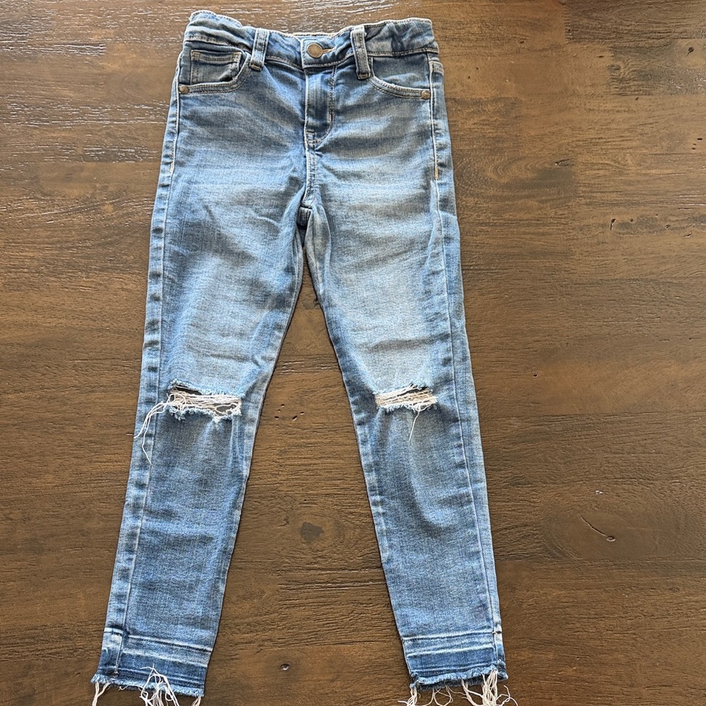 Distressed Blue Denim Jeans
